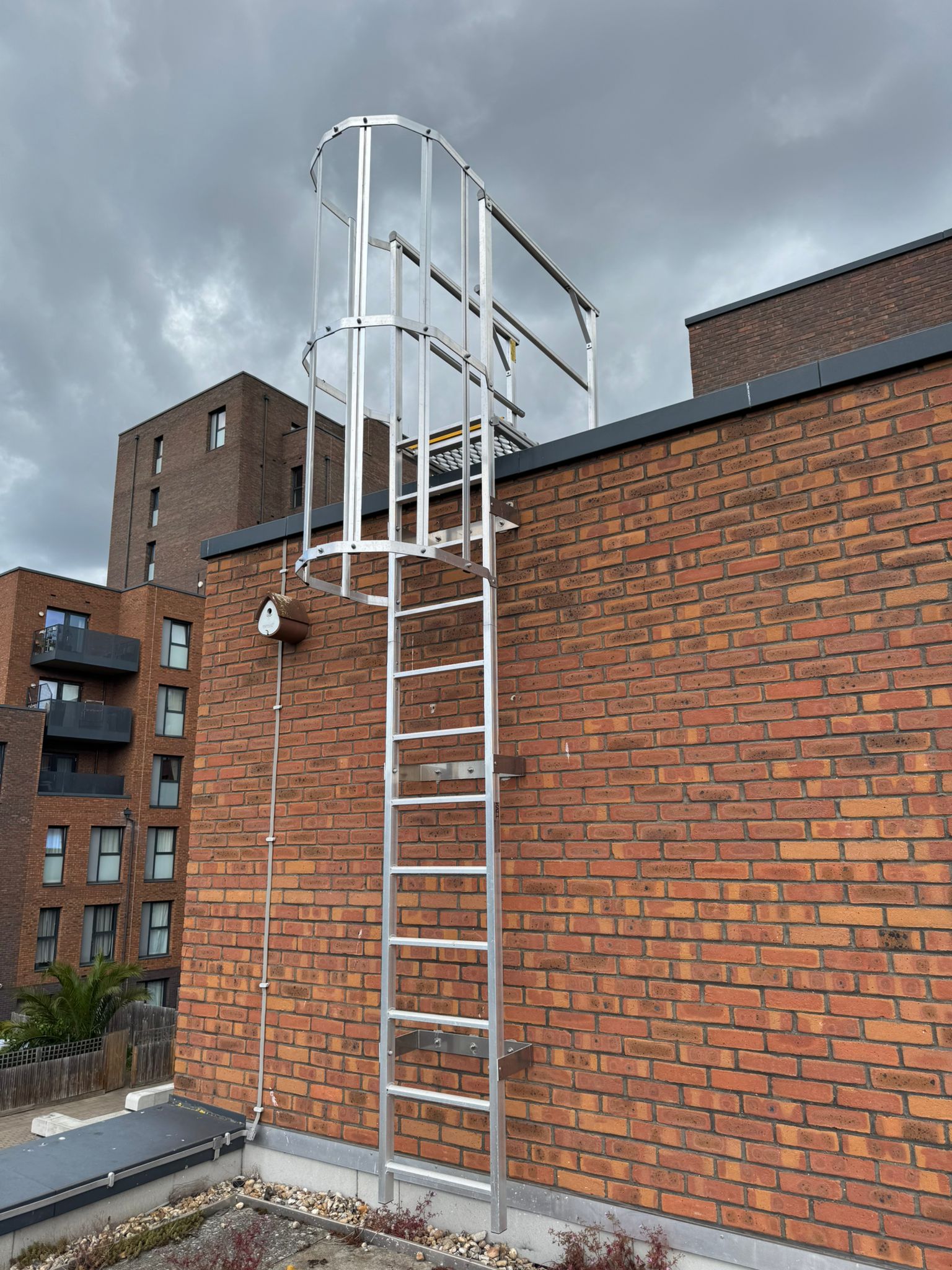 Ladder Fall Arrest Systems — Sky Height Safety engineers on site, working to BS EN 353-1, BS EN 353-2, BS EN 795